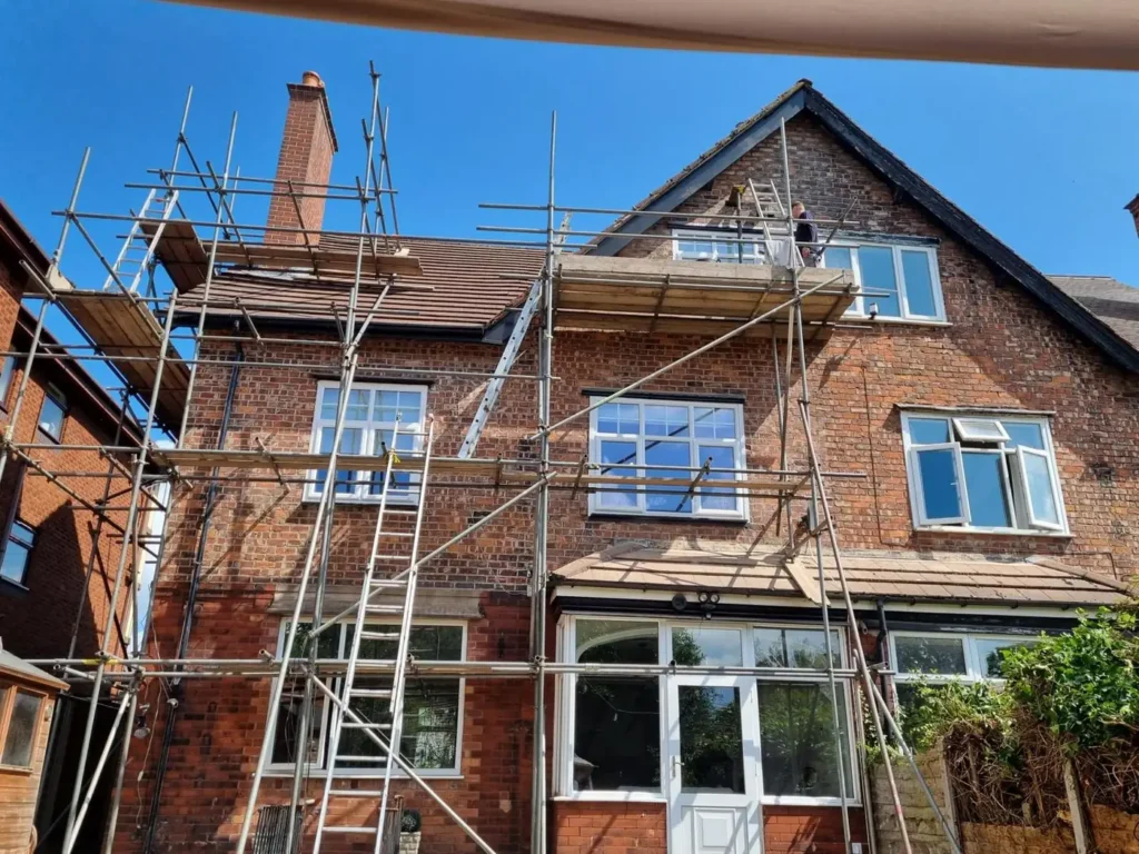 House fully scaffolded for a roof renewal