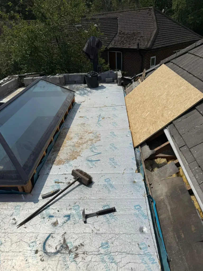 Flat roof insulation with new rooflights