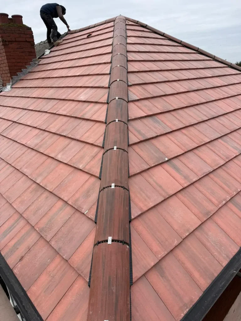 New red tiled roof with ridge tiles