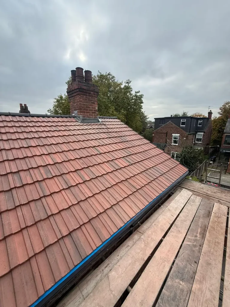 New roof tiles with scaffold boards in place
