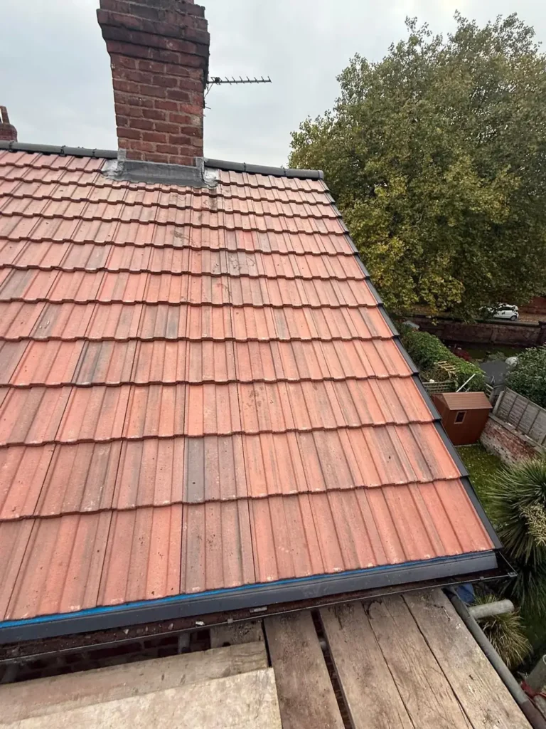 New red tiled roof with black fascia
