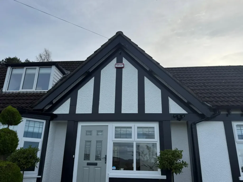 Refurbished black and white gable on a bungalow