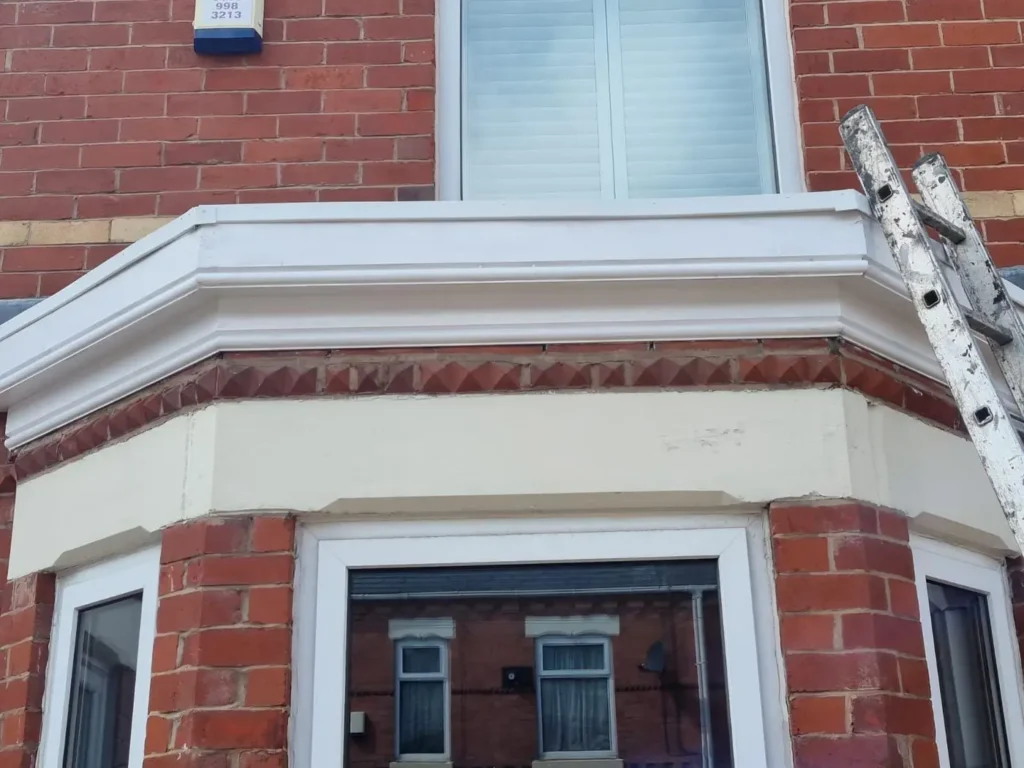 Bay window with new white fascia and guttering